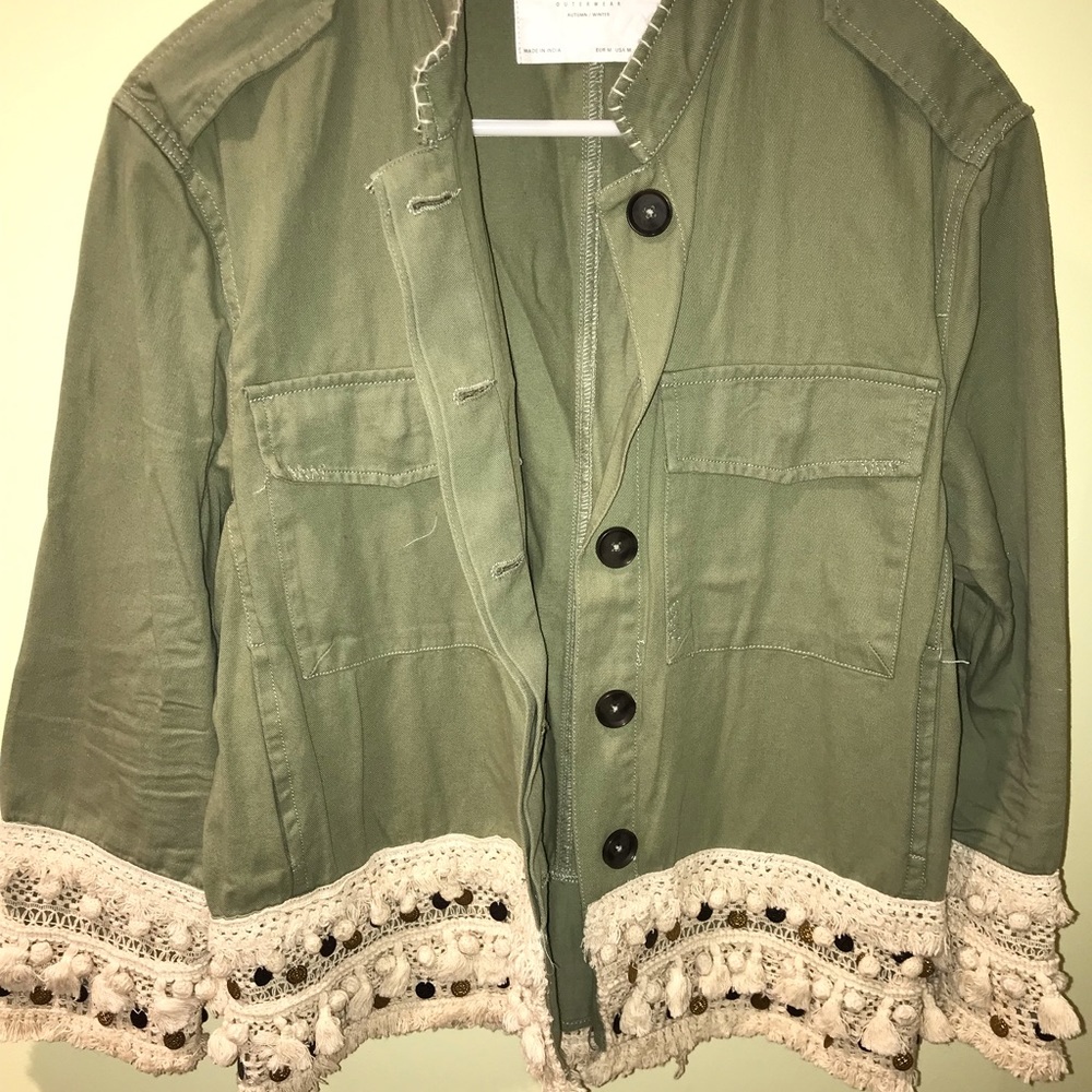 Green jacket with fun fringe design